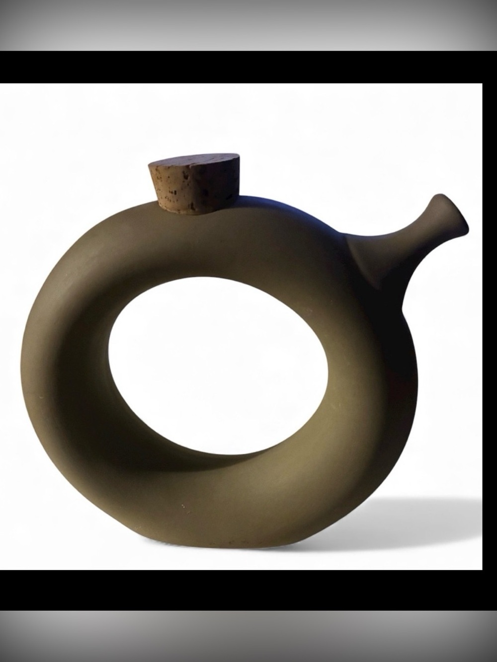 Hartstone Pottery donut-shaped decanter pitcher from the 1960s /70’s Tan Vessel